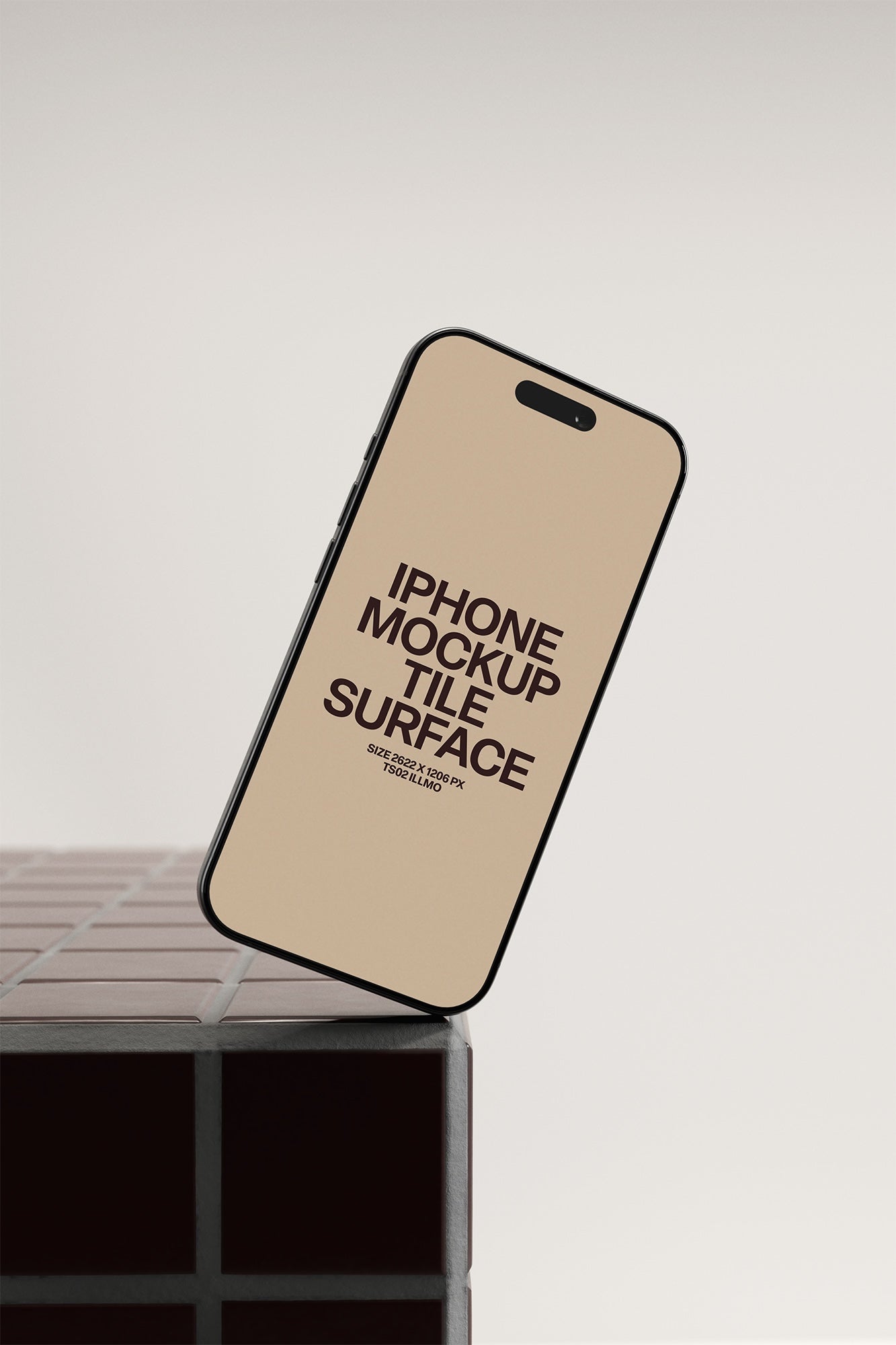 iPhone mockup on a burgundy tile table with a beige UI placeholder for web and desktop UI presentation, angled view