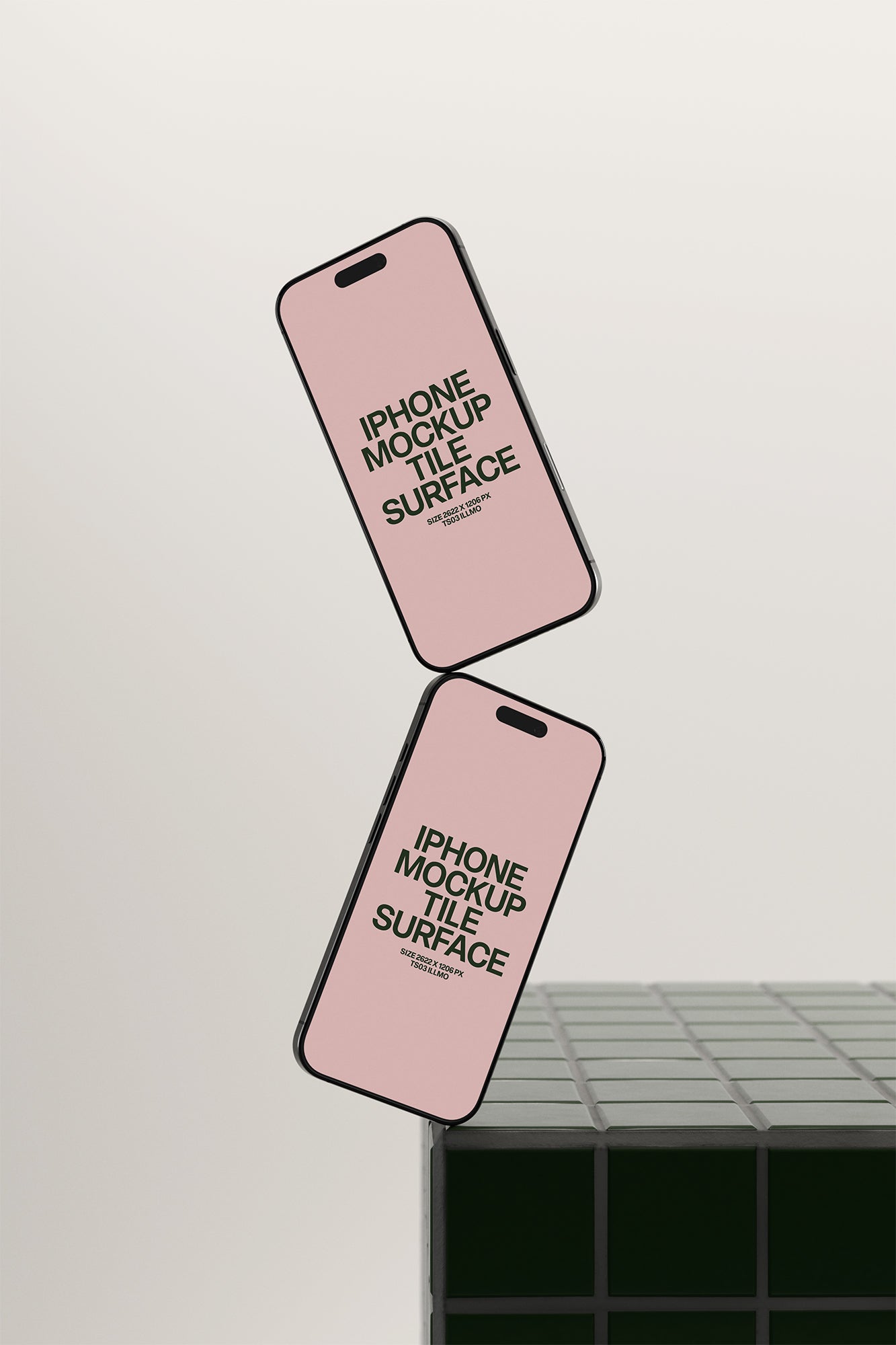 Two floating iPhone mockups on green tile surface with pink UI for app and UI design presentation